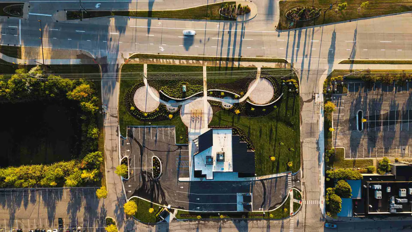 Aerial closeout-stage site visual showing completed commercial construction conditions